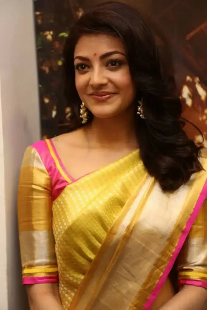 Kajal Aggarwal In Yellow Saree At Designer Store Launch